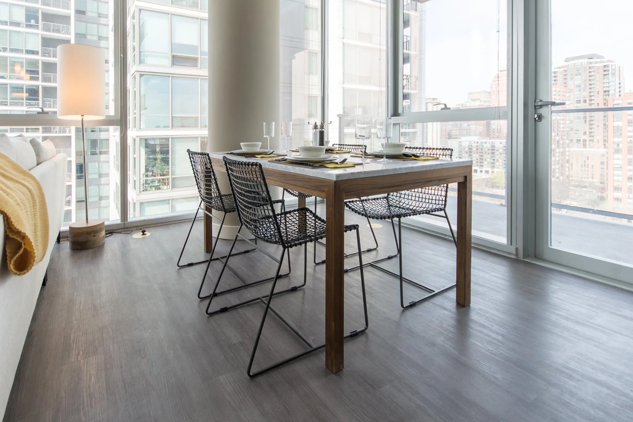 living room and skyline view at 1000 South Clark Apartments