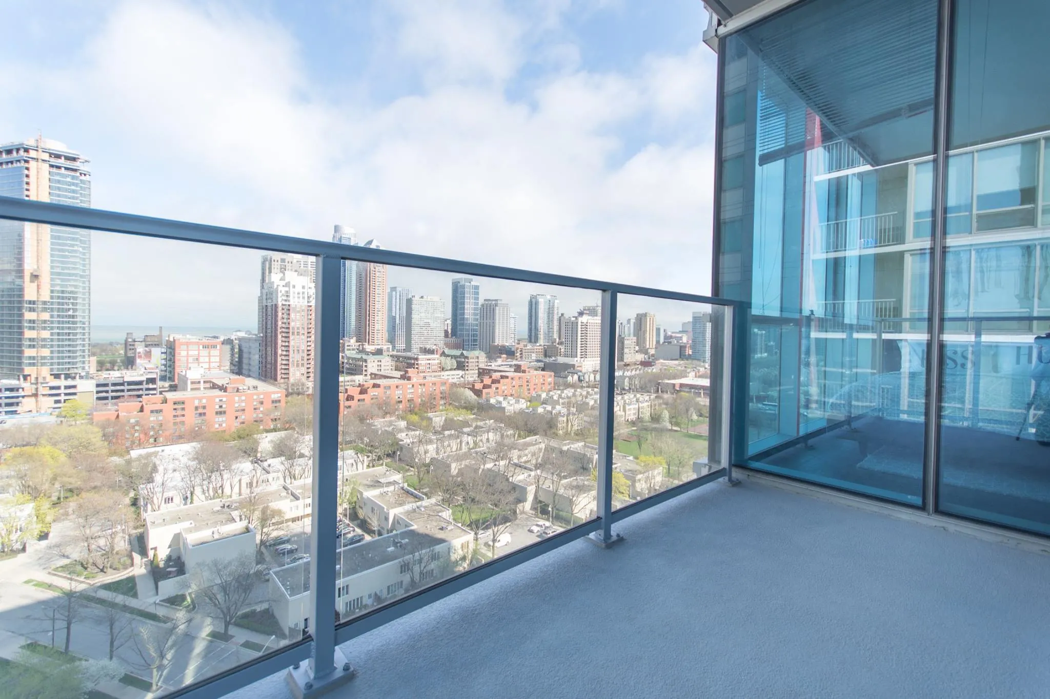 living room and skyline view at 1000 South Clark Apartments