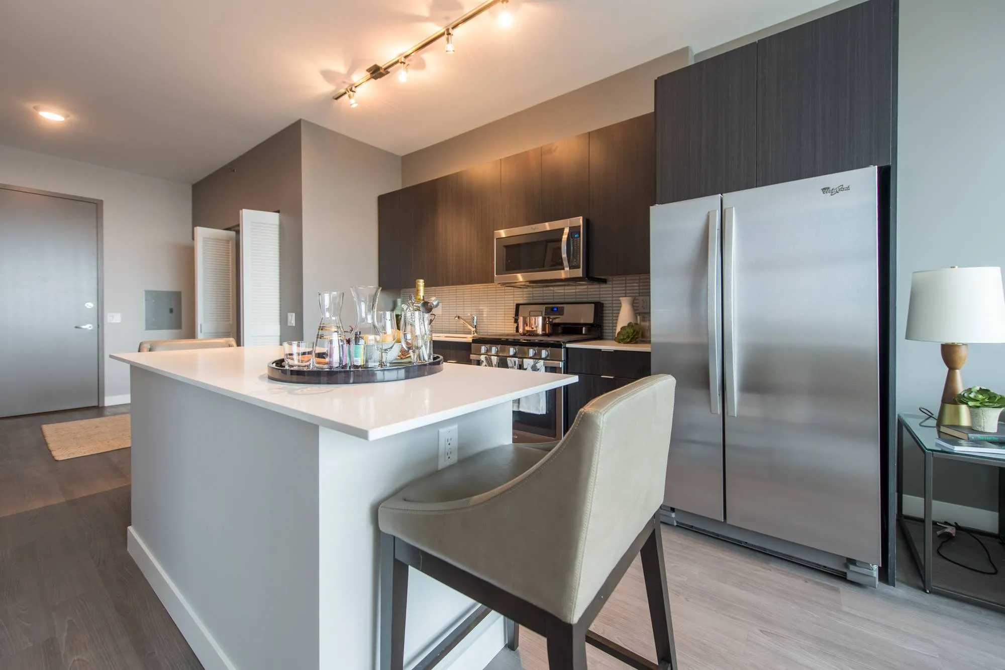living room and skyline view at 1000 South Clark Apartments