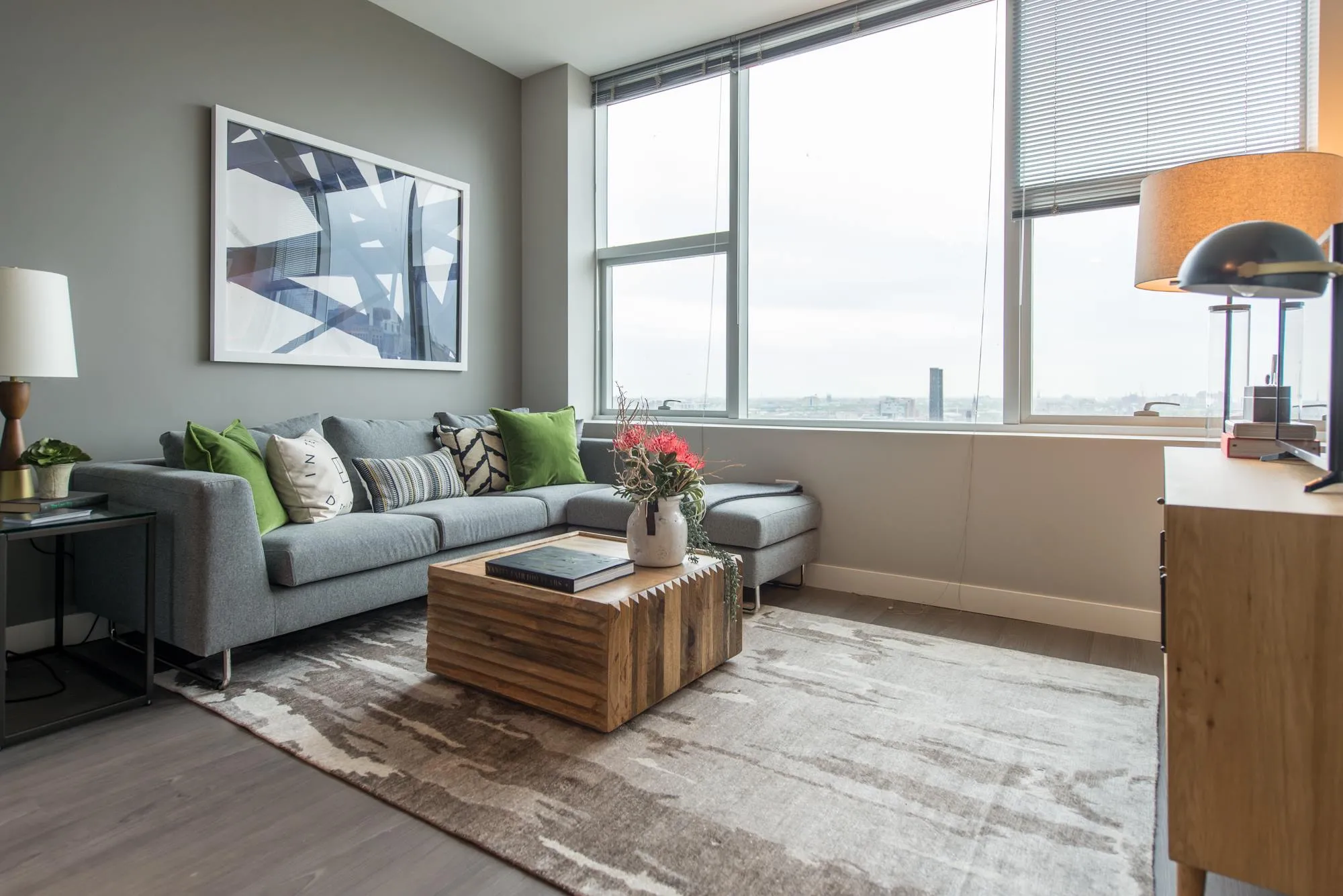 living room and skyline view at 1000 South Clark Apartments