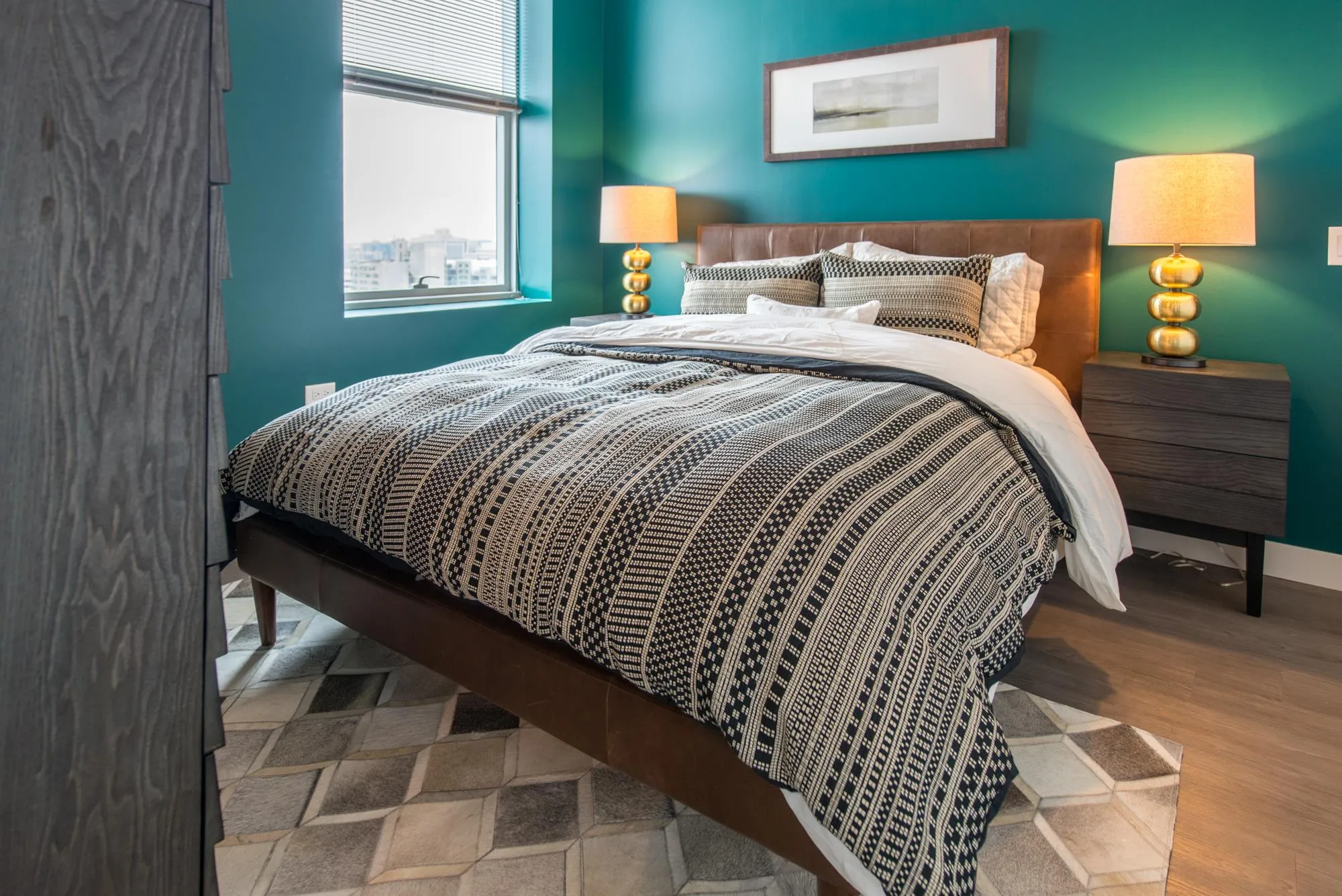 living room and skyline view at 1000 South Clark Apartments