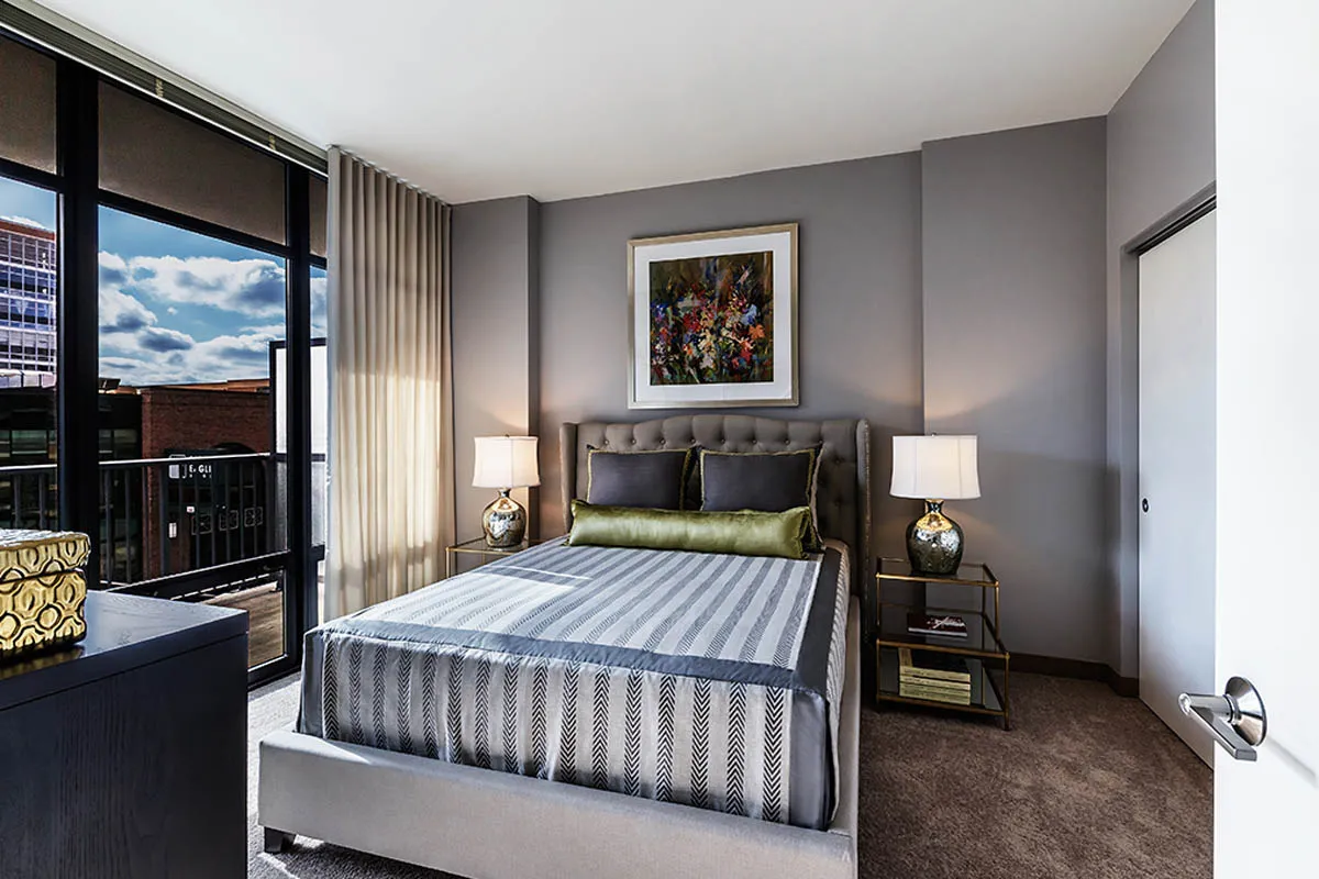 kitchen with view of living room at The Madison at Racine Apartments