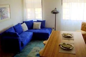 exterior view of trees and the two towers of 5630 North Sheridan Apartments