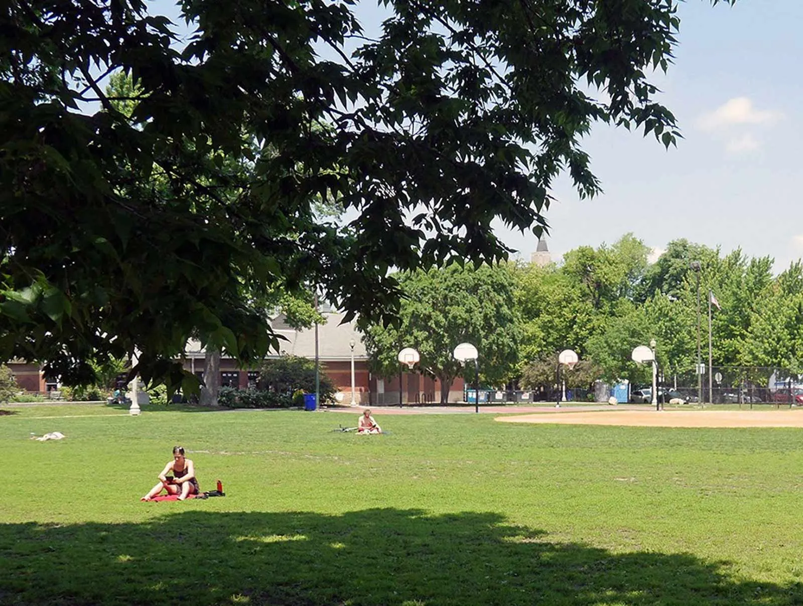 giant loft living room with wood floors at 1550 North Damen Lofts