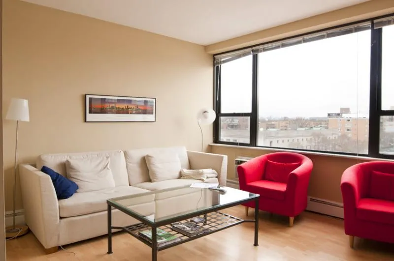 living rom with view from windows at 1575 Oak Apartments in Evanston IL