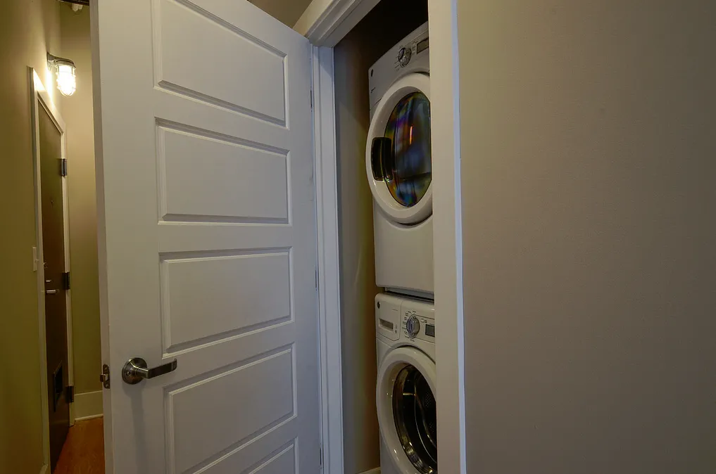 exposed brick in living room of 3141 North Sheffield Apartments in Lakeview