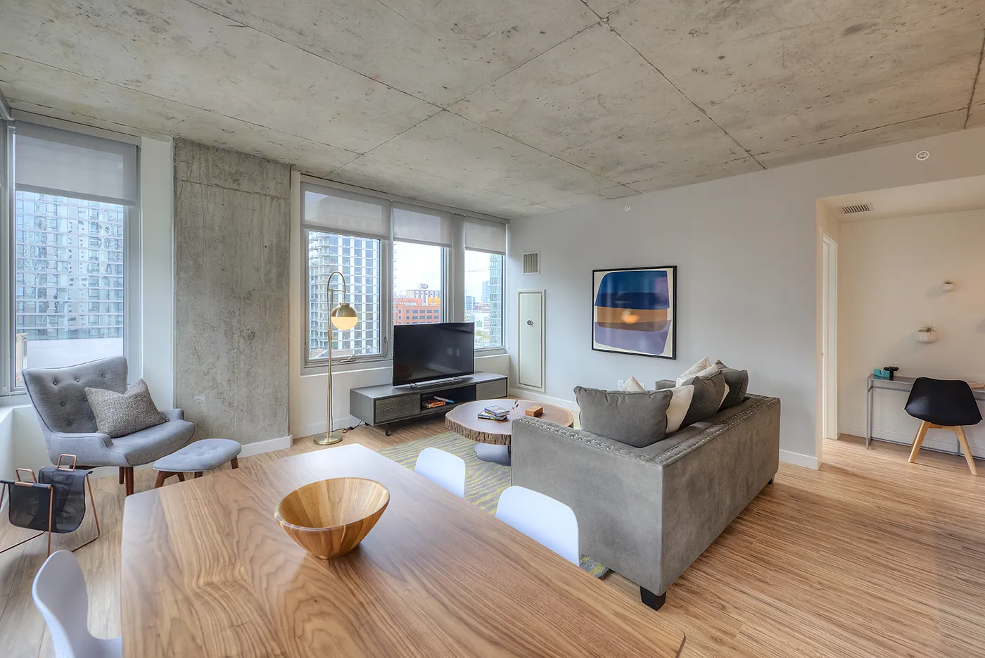 living room and dining room madel apartment at Emme Chicago Apartments