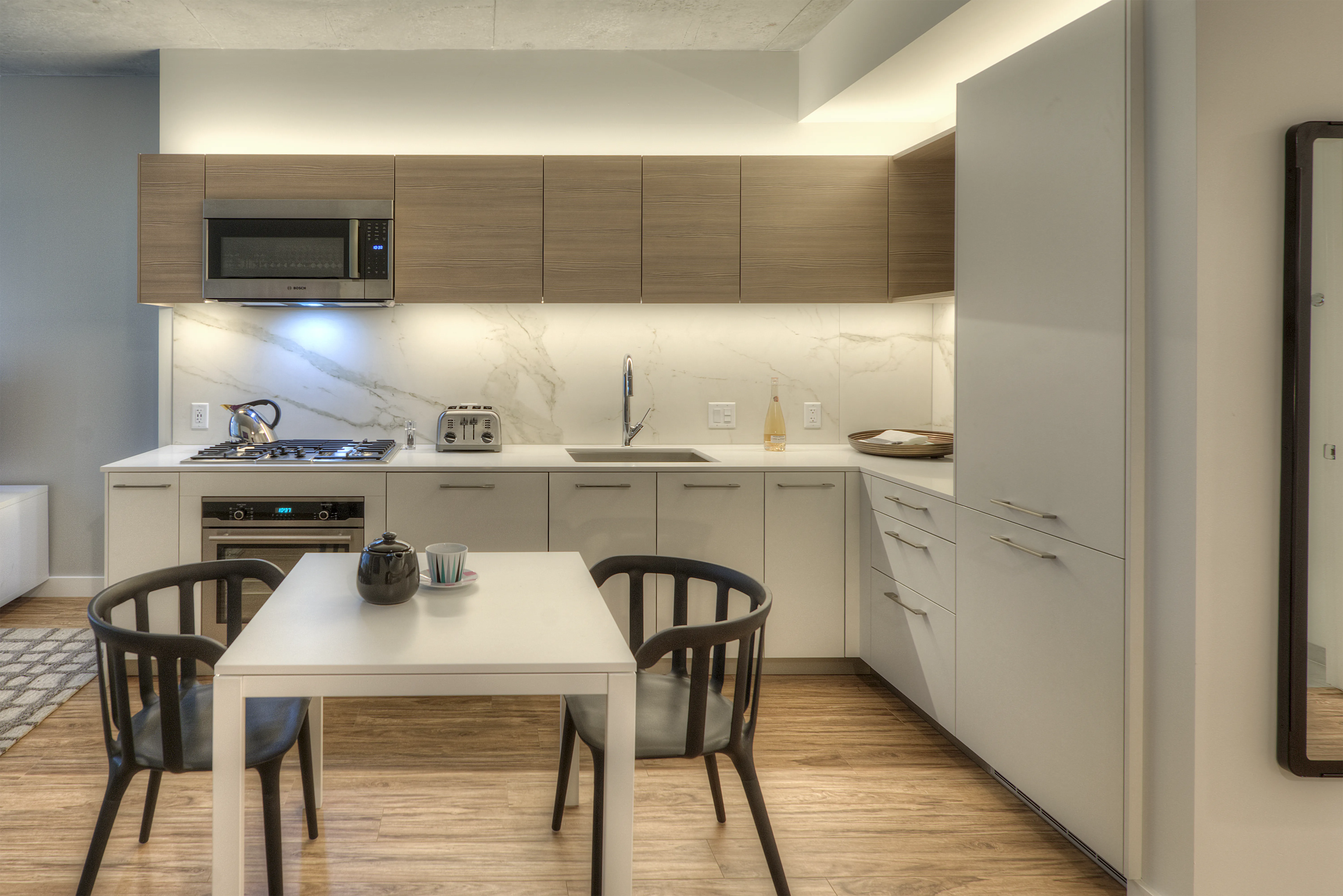 living room and dining room madel apartment at Emme Chicago Apartments