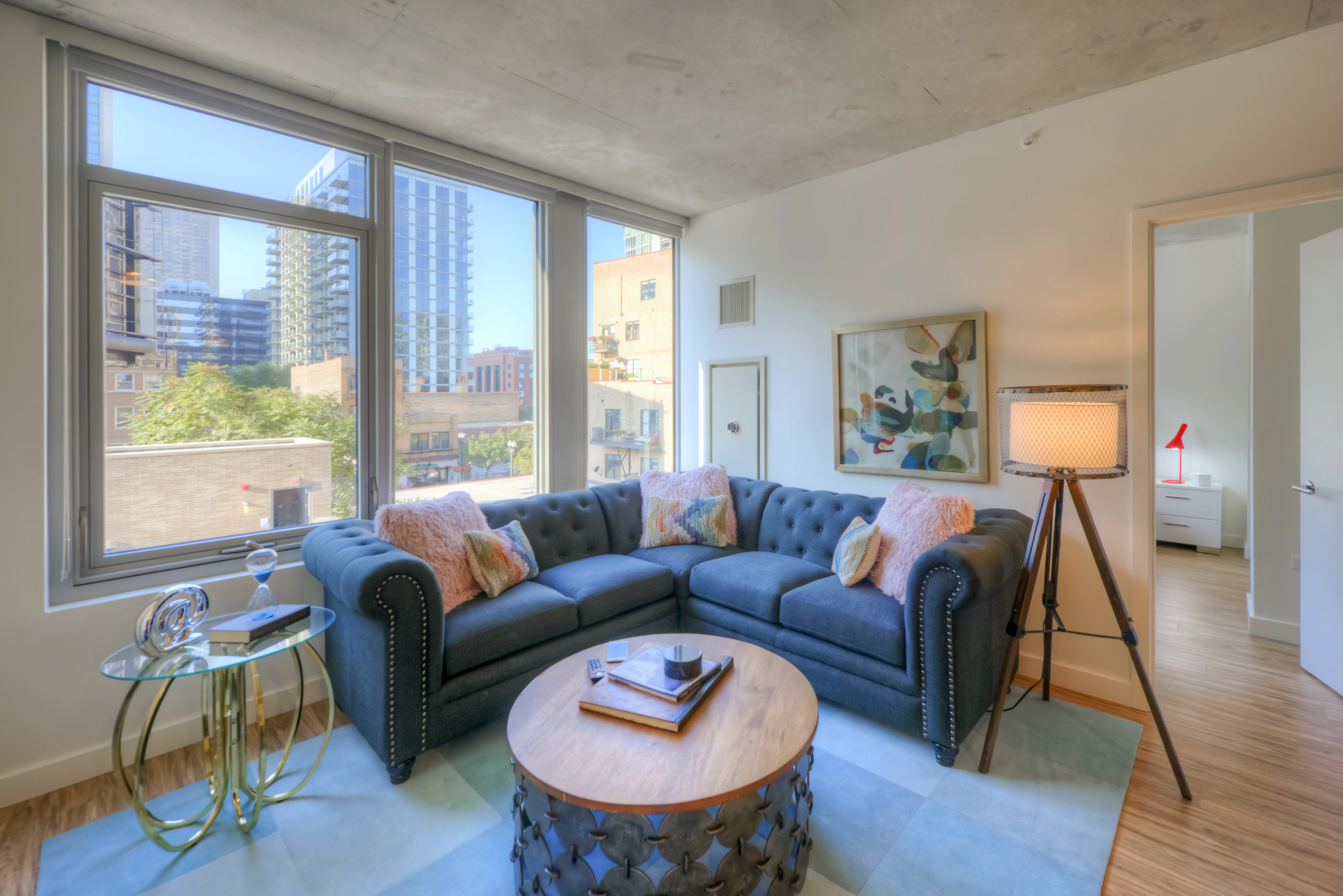 living room and dining room madel apartment at Emme Chicago Apartments