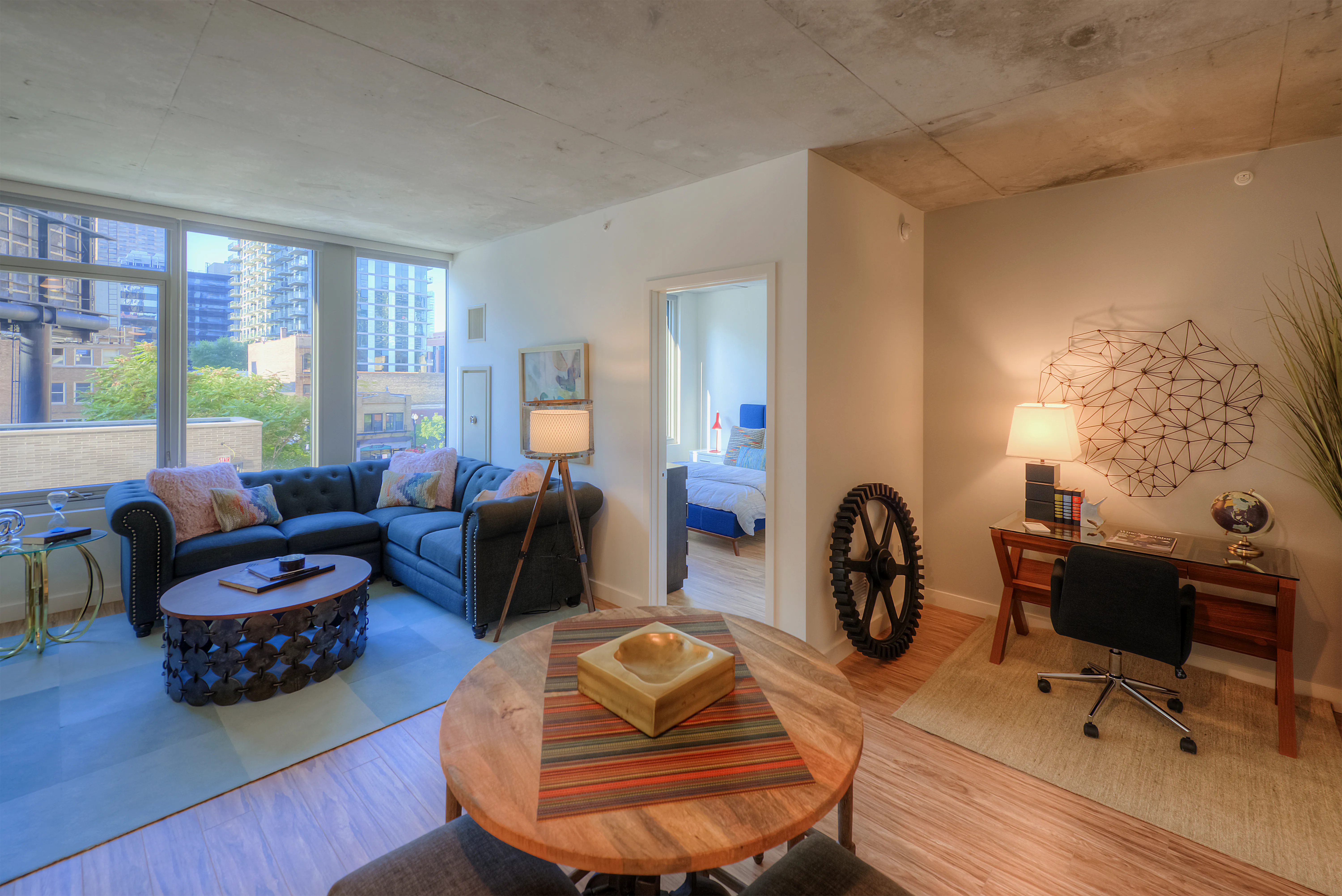 living room and dining room madel apartment at Emme Chicago Apartments