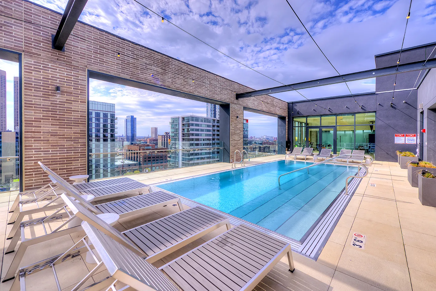 living room and dining room madel apartment at Emme Chicago Apartments