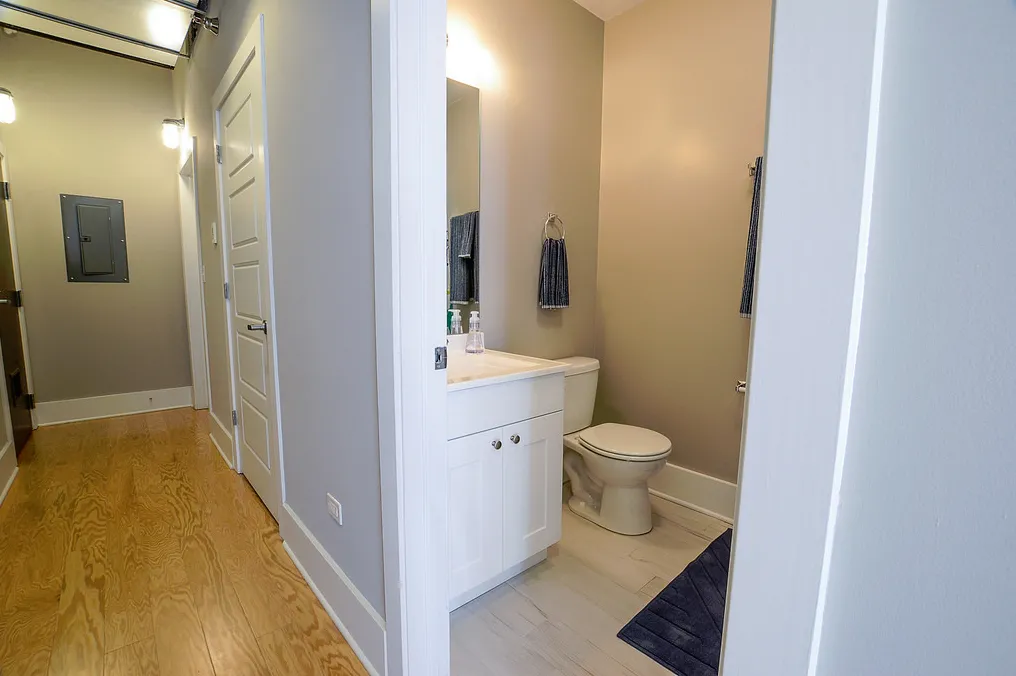 exposed brick in living room of 3141 North Sheffield Apartments in Lakeview