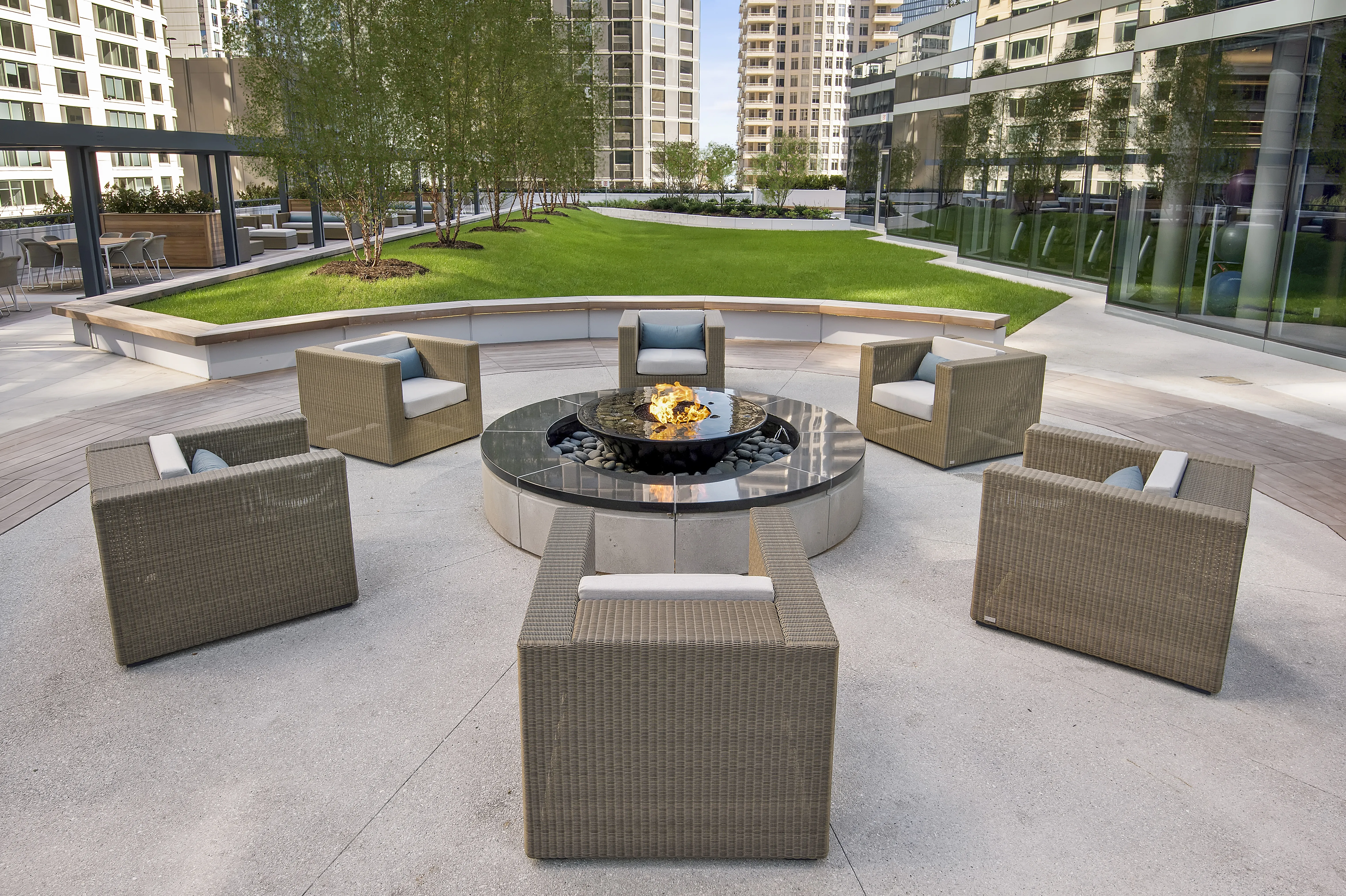 living room with brown couch at Moment Apartments in Streeterville Chicago