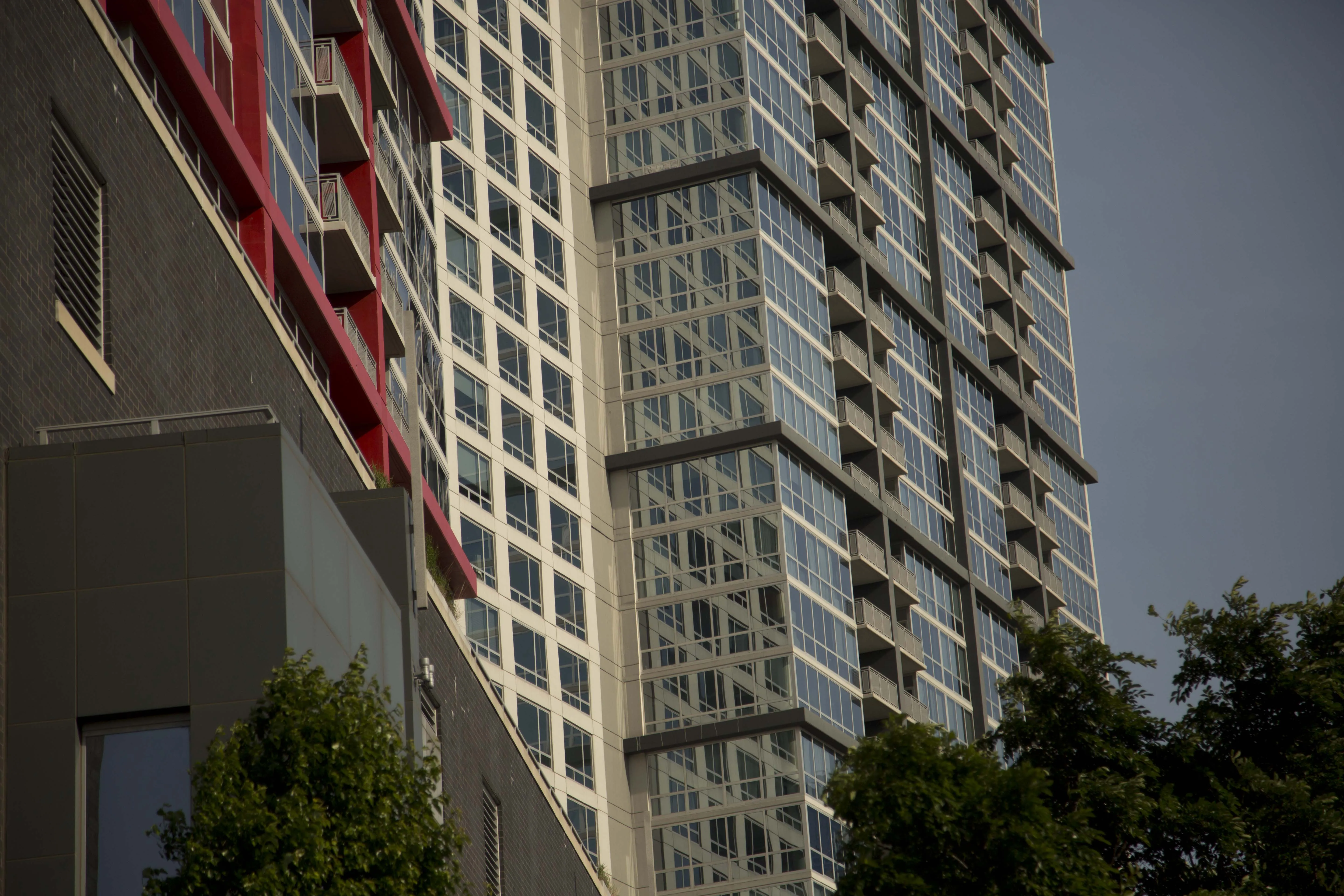 exterior of glass and steel apartment high-rise tower in South Loop, Chicago