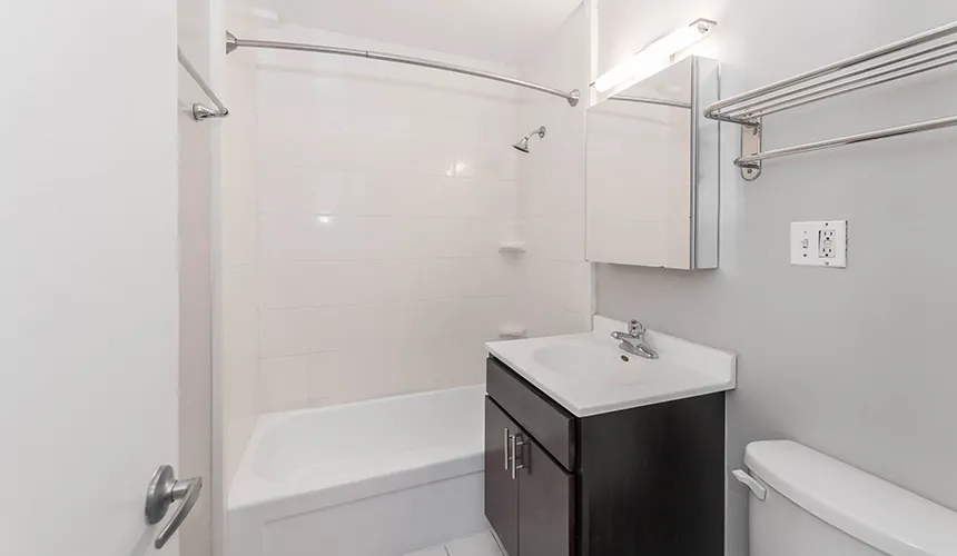 street entrance of Reside on Wellington Apartments in Lakeview Chicago