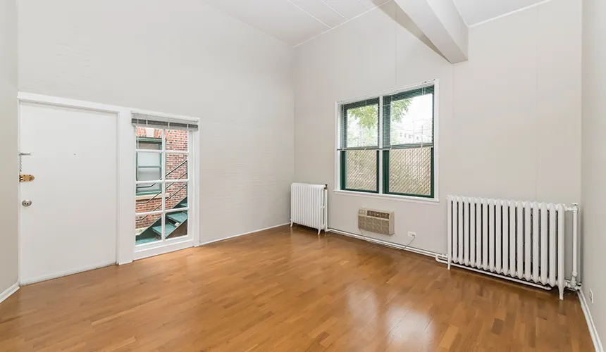 street entrance of Reside on Wellington Apartments in Lakeview Chicago