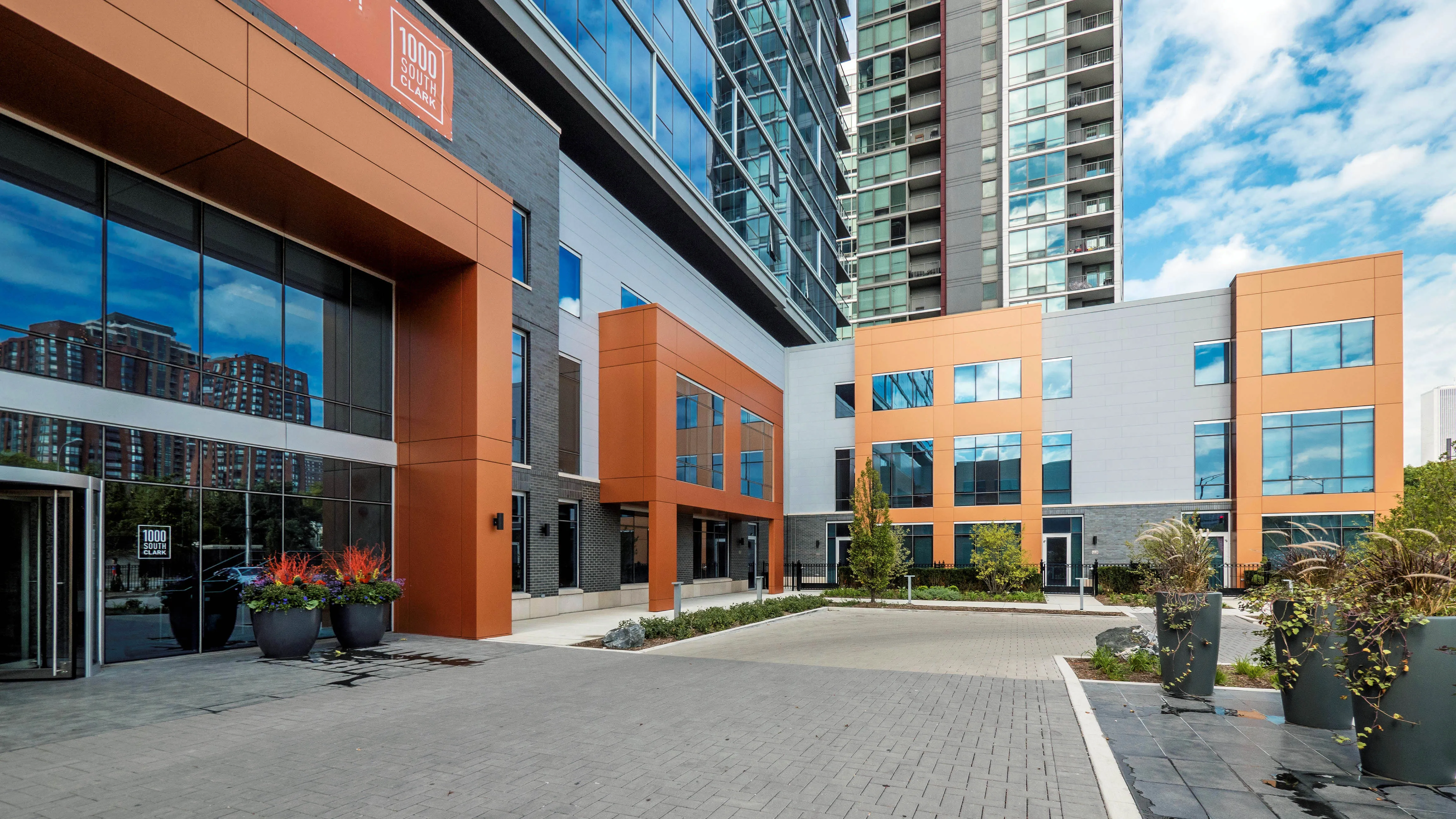 living room and skyline view at 1000 South Clark Apartments