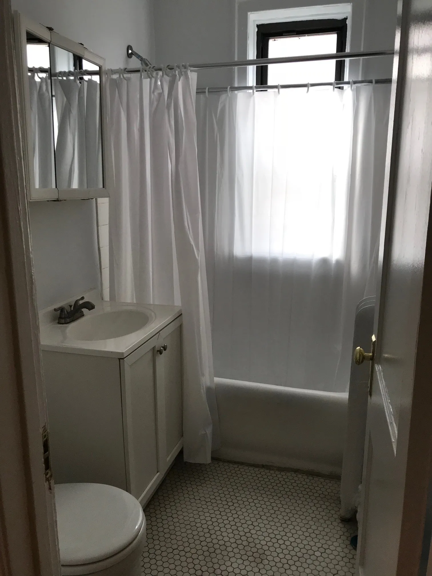 vintage living room with wood floors at 627-41 West Roscoe Apartments