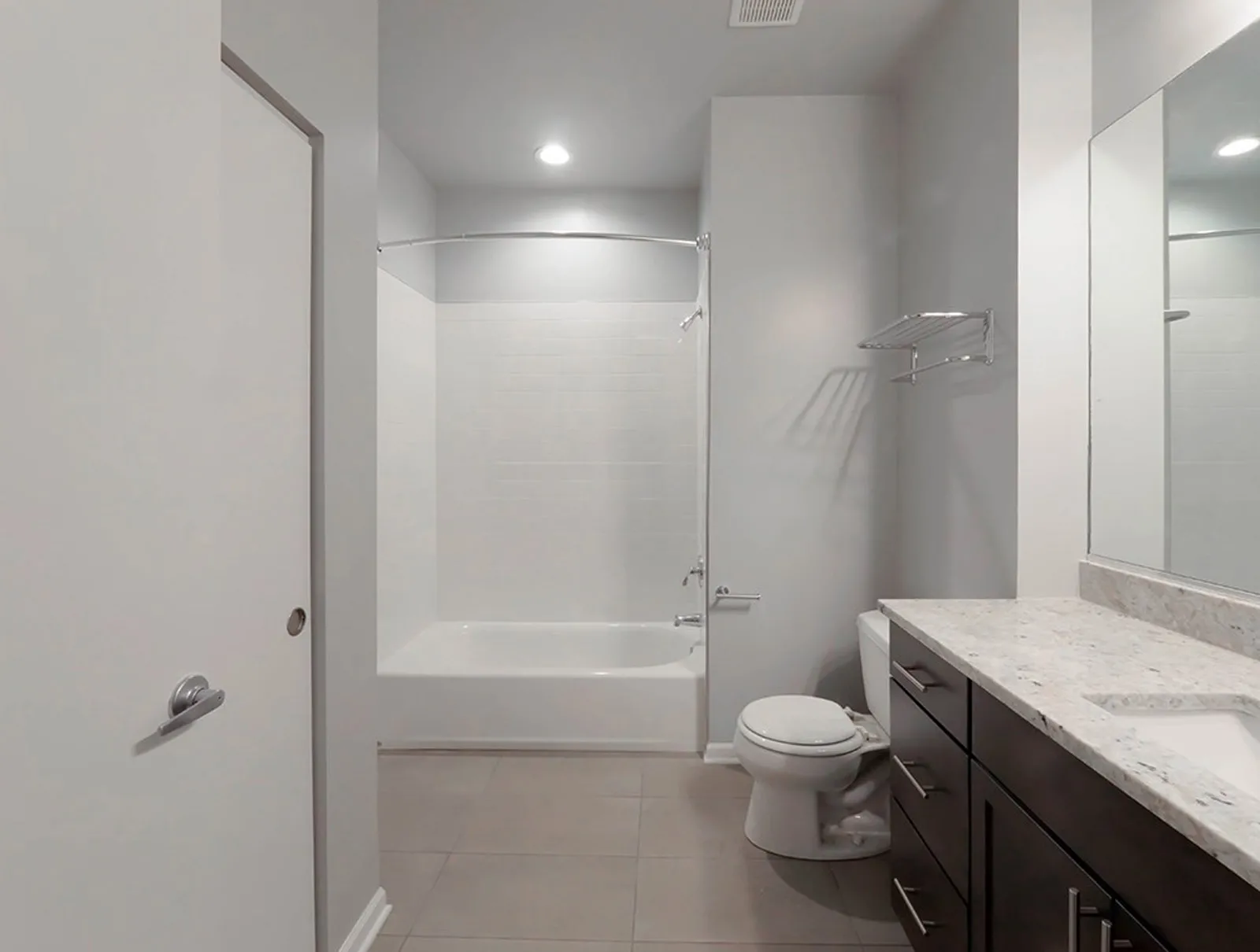 giant loft living room with wood floors at 1550 North Damen Lofts