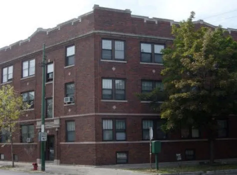 corner view of dark brown brick building at 1243 West Byron Apartments