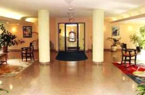 exterior view of trees and the two towers of 5630 North Sheridan Apartments