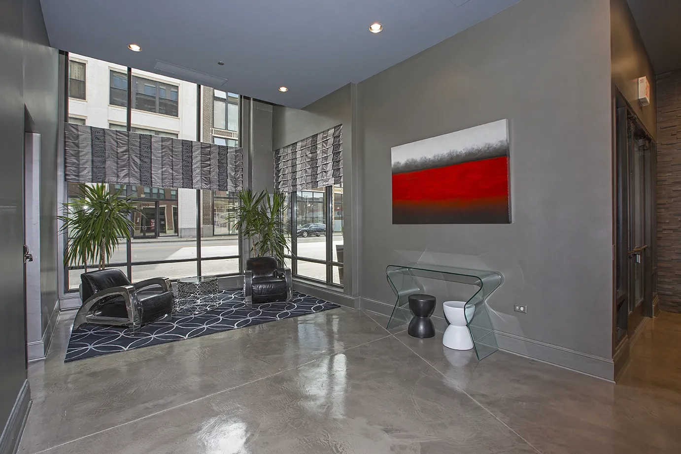modern kitchen with brown wood cabints at The Shelby Apartments in Chicago