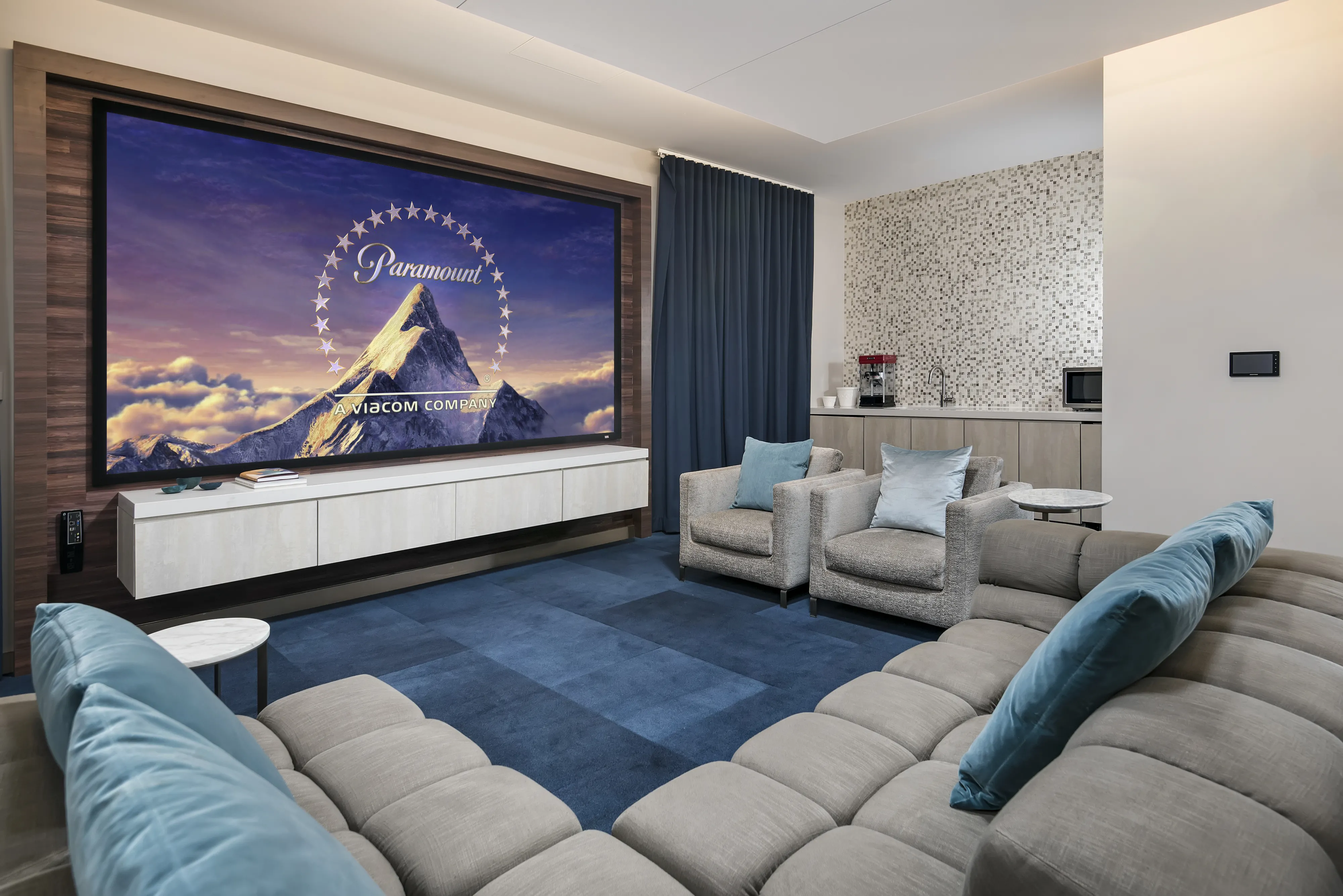 living room with brown couch at Moment Apartments in Streeterville Chicago