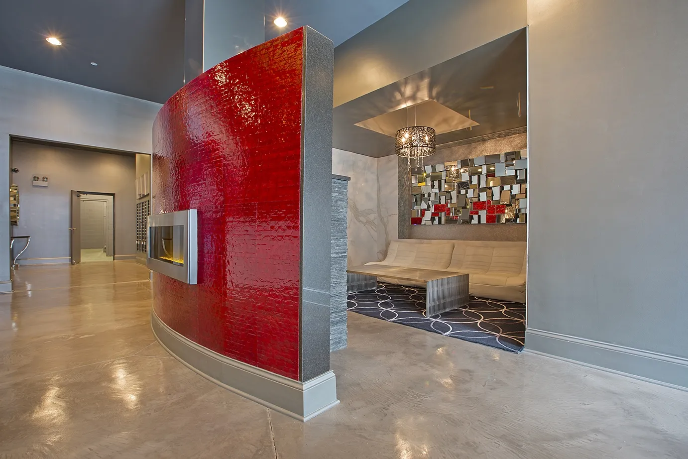 modern kitchen with brown wood cabints at The Shelby Apartments in Chicago