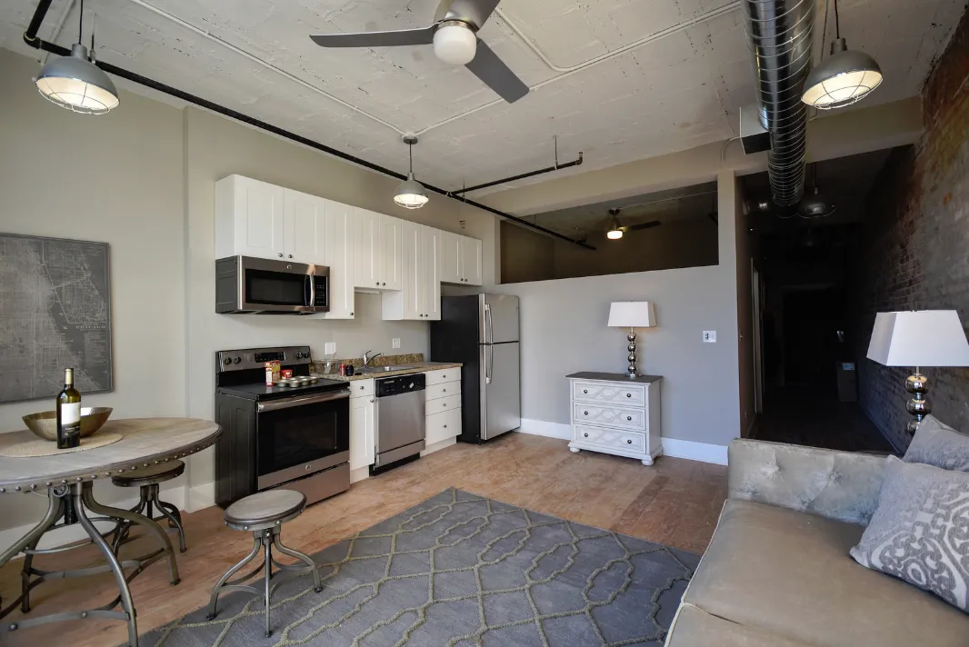 exposed brick in living room of 3141 North Sheffield Apartments in Lakeview