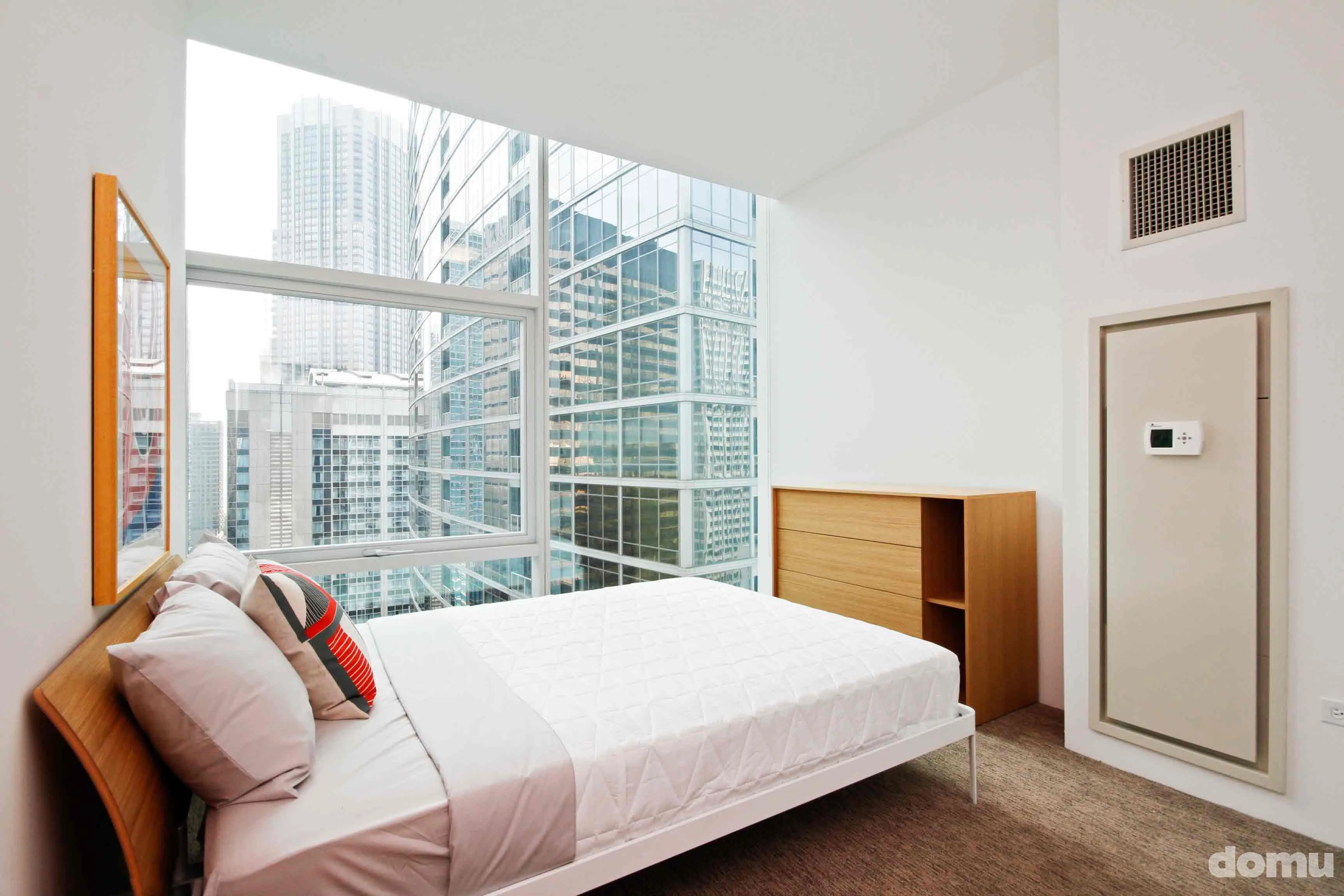 model kitchen with view of Chicago at Optima Signature Apartments