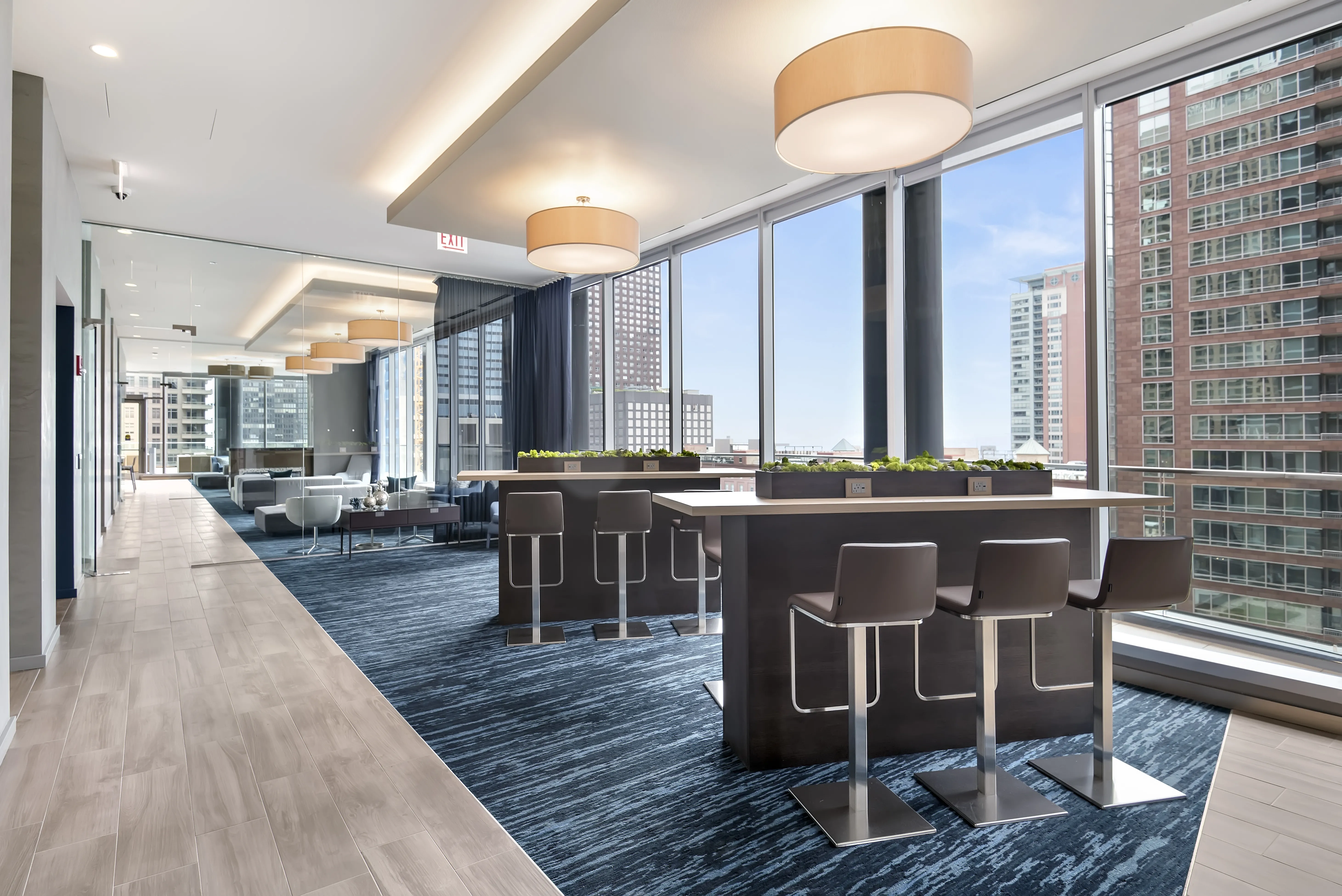 living room with brown couch at Moment Apartments in Streeterville Chicago