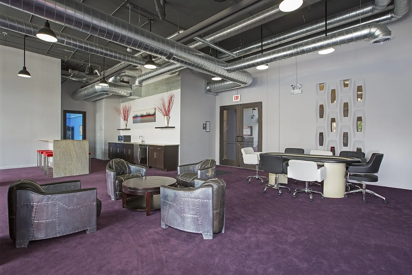 modern kitchen with brown wood cabints at The Shelby Apartments in Chicago