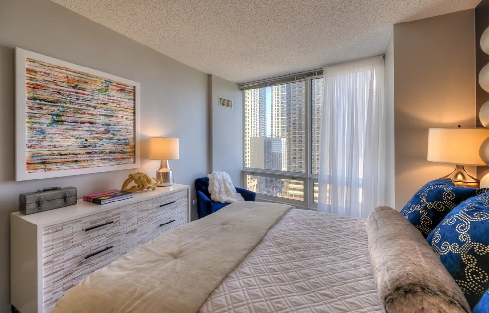 living room with downtown view at Atwater apartments in Streeterville