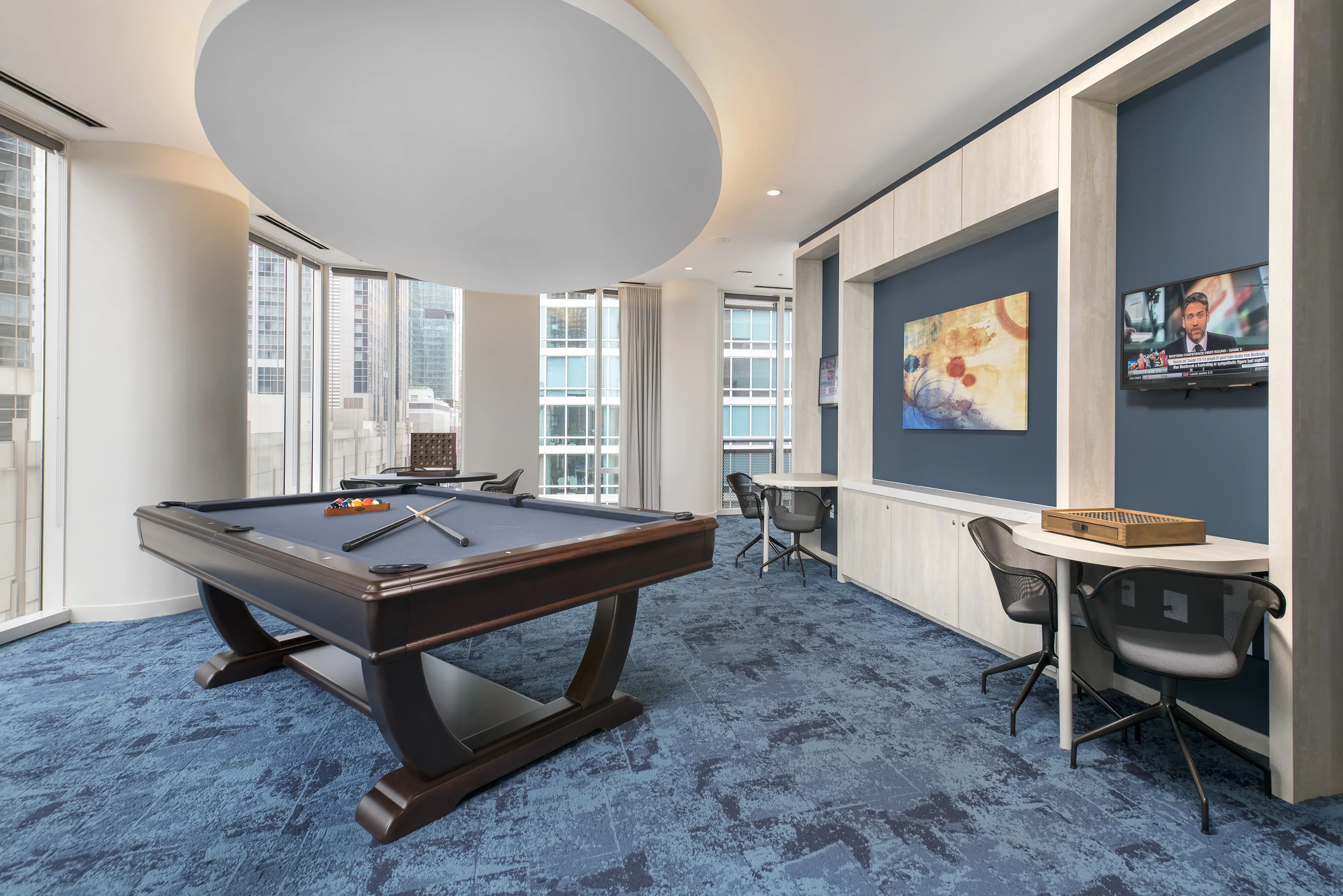 living room with brown couch at Moment Apartments in Streeterville Chicago