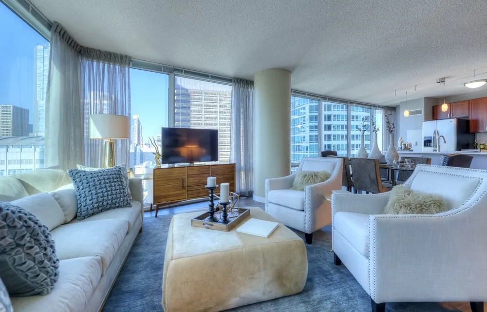 living room with downtown view at Atwater apartments in Streeterville
