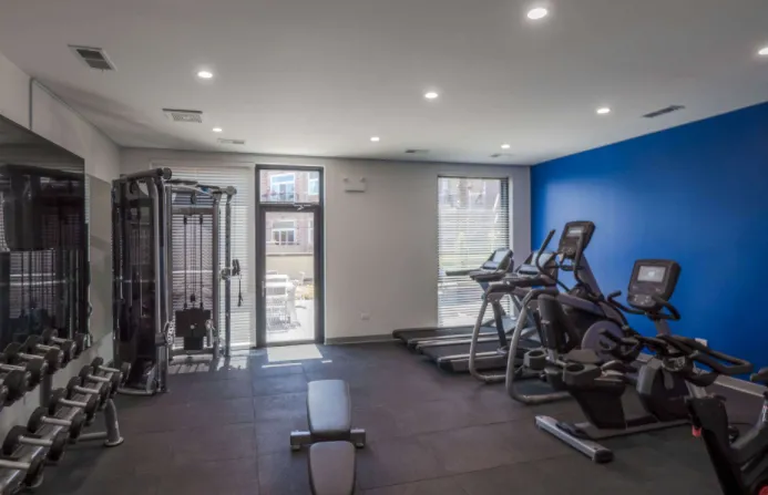 model kitchen with island at Linkt Apartments in River West