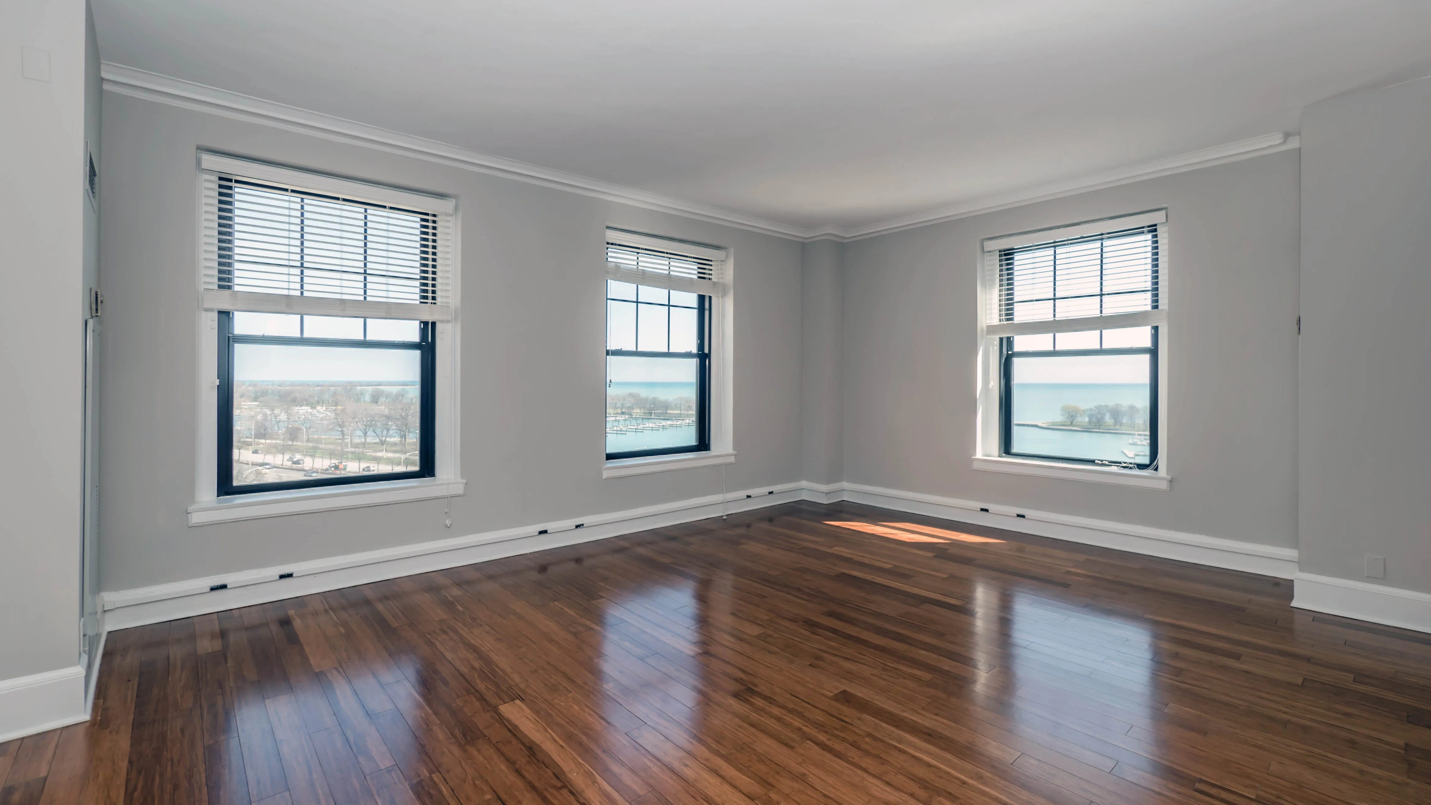 lobby entrance with limestone facade at The Belmont By Reside Apartments