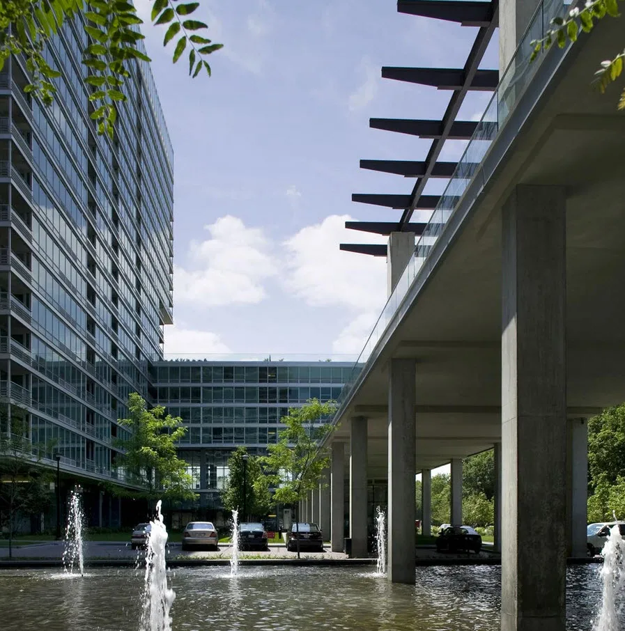 rendering look up at the architecture of Optima Old Orchard Woods Apartment