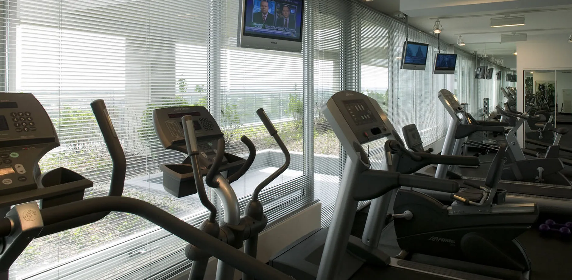 rendering look up at the architecture of Optima Old Orchard Woods Apartment