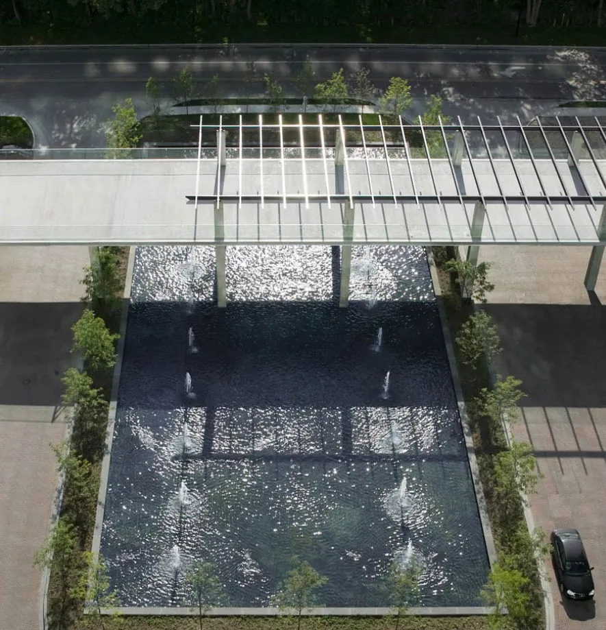 rendering look up at the architecture of Optima Old Orchard Woods Apartment