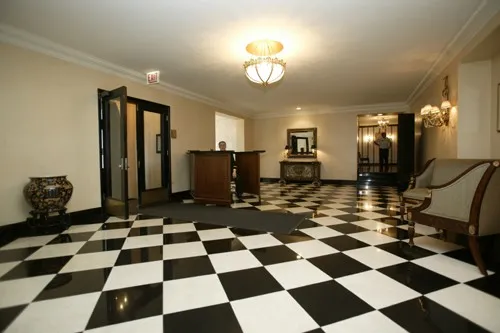 enormous living room with wood floors at 3000 N Sheridan Apartments