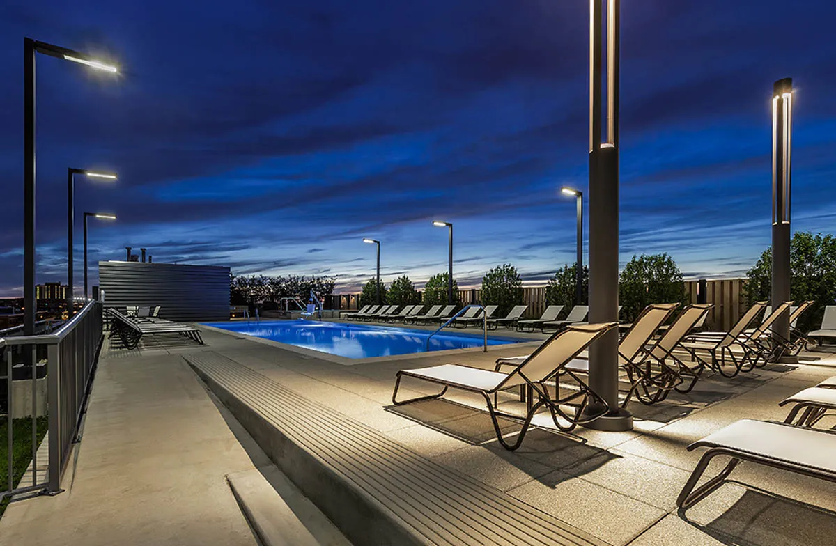 kitchen with view of living room at The Madison at Racine Apartments