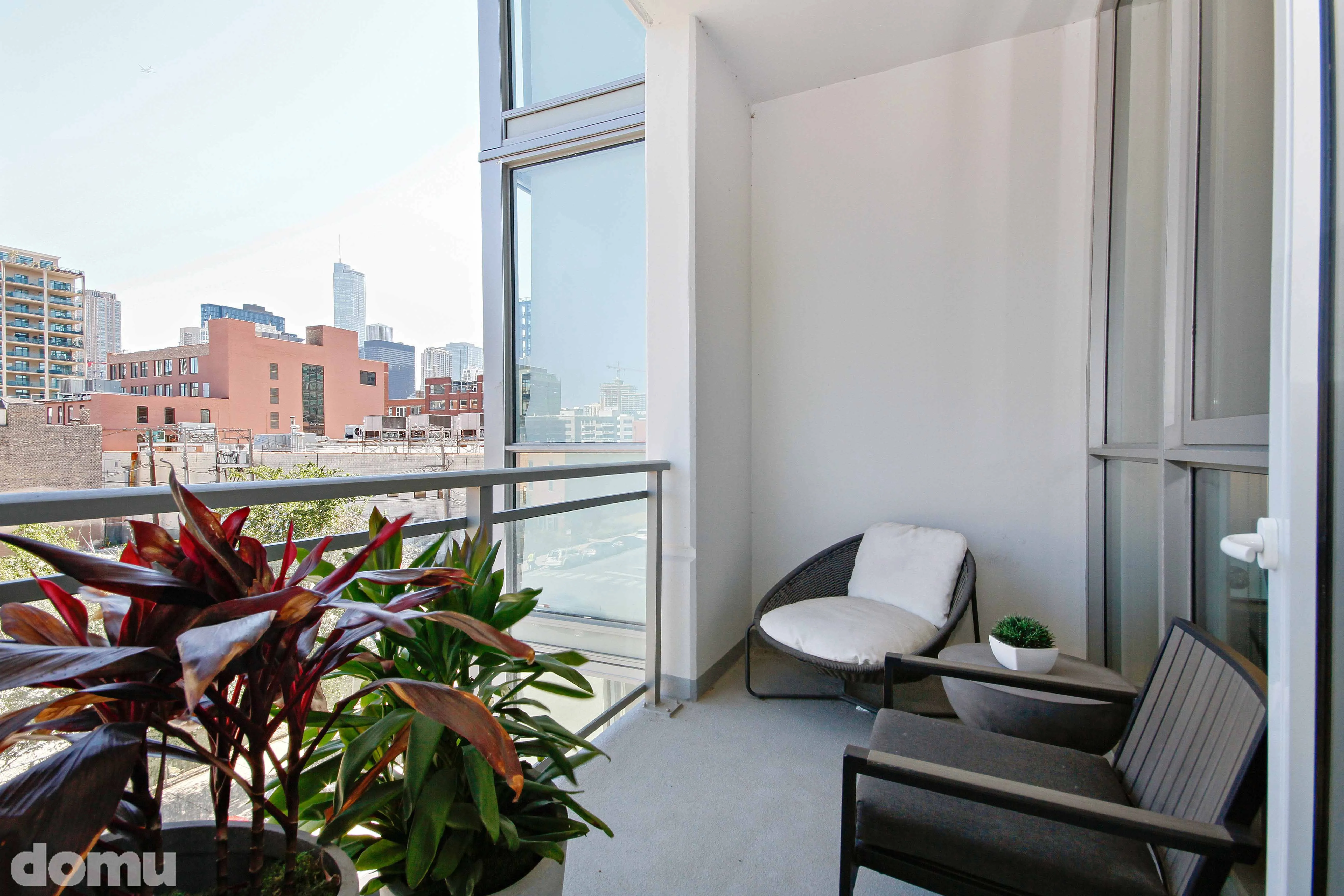 kitchen with stone countertops at The Hudson Apartments in Chicago
