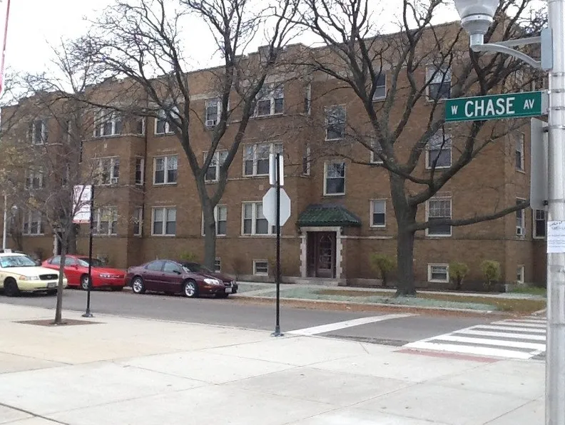 entry lobby wood door of Chase Manor Apartments