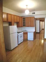 exterior limestone at 3822 North Sheffield Apartments