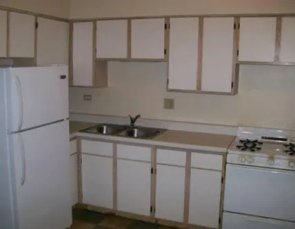 across the street from 4655 S Lake Park Apartments with cars in front