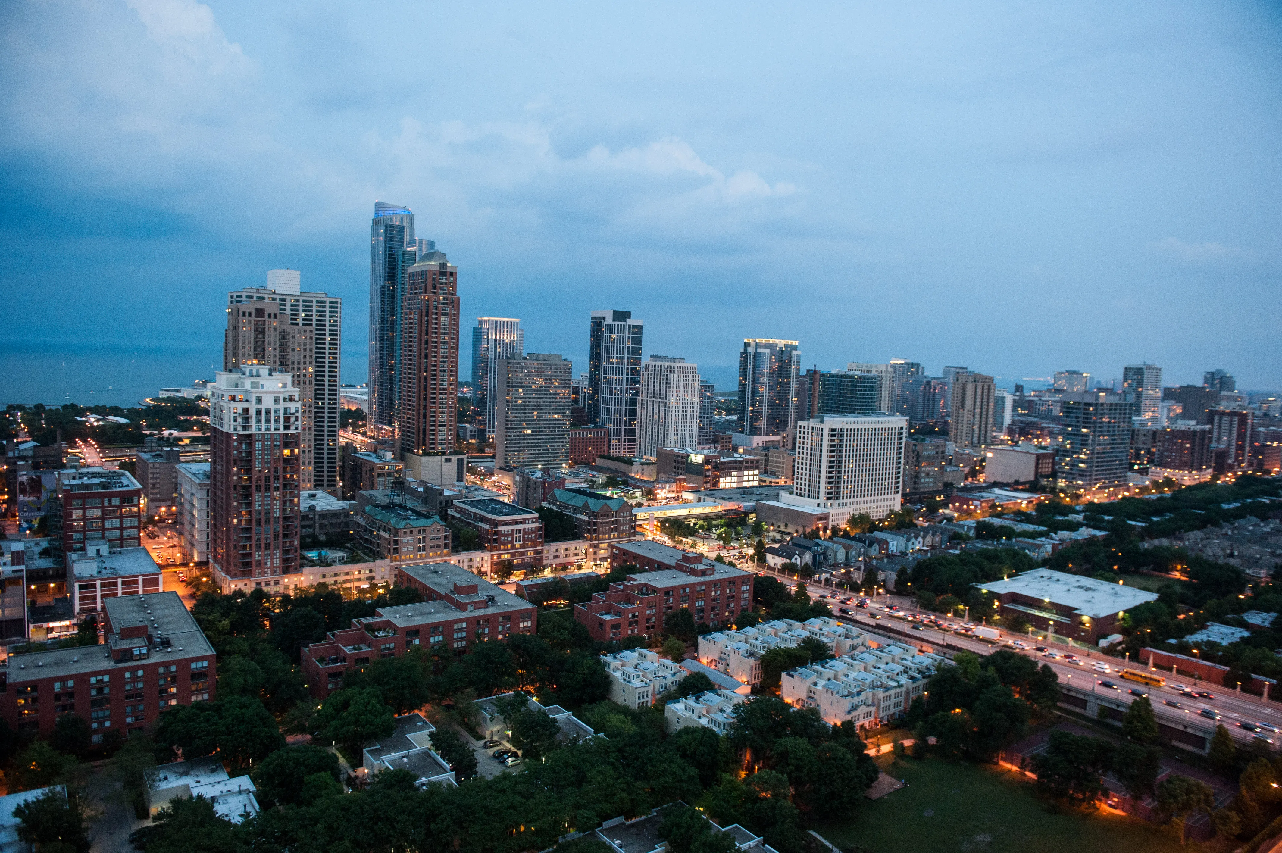 living room and skyline view at 1000 South Clark Apartments