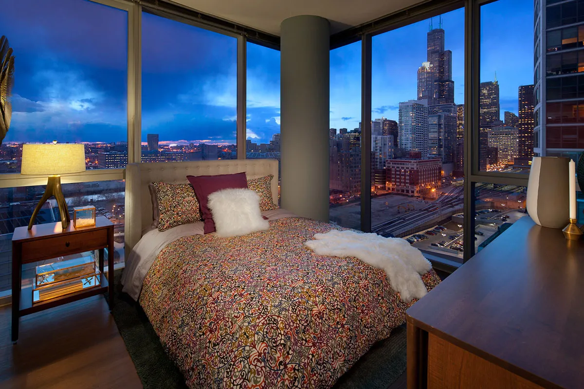 living room and skyline view at 1000 South Clark Apartments