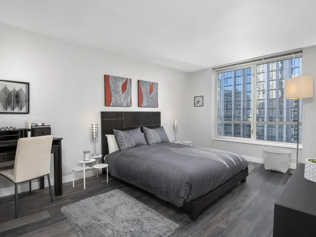 furnished model living room at One East Delaware Apartments