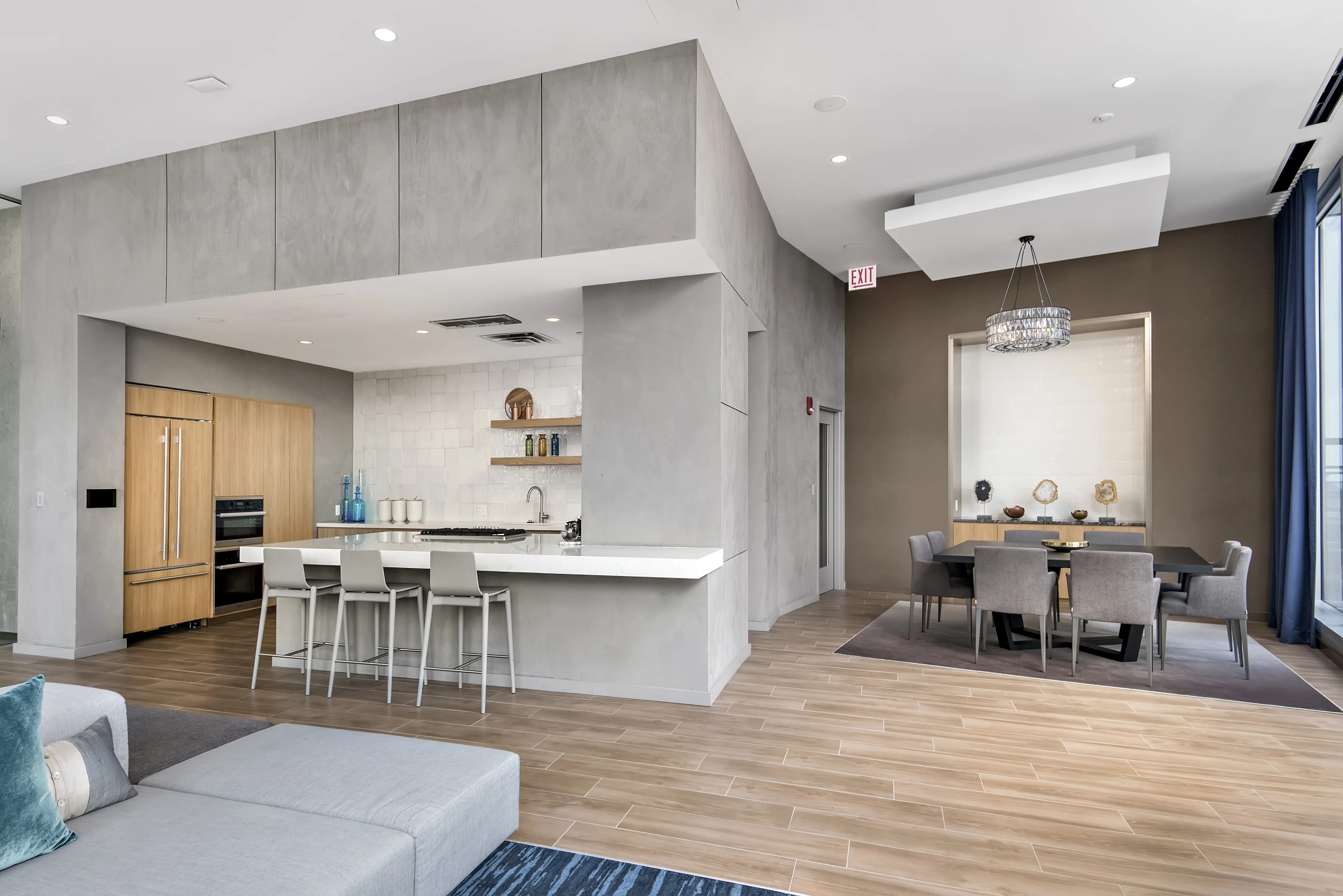 living room with brown couch at Moment Apartments in Streeterville Chicago